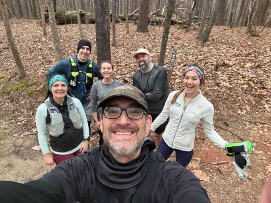 Group of people taking a picture during trail run